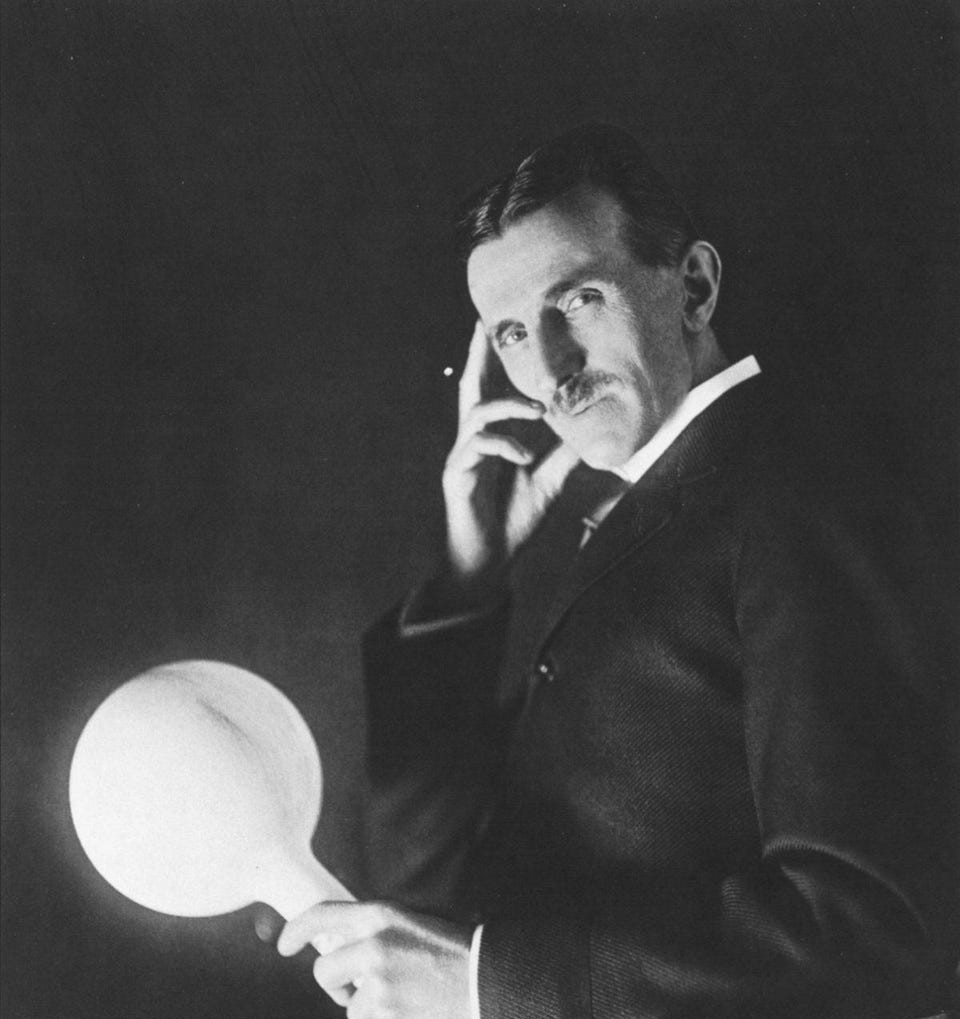 Nikola Tesla with a Light Source